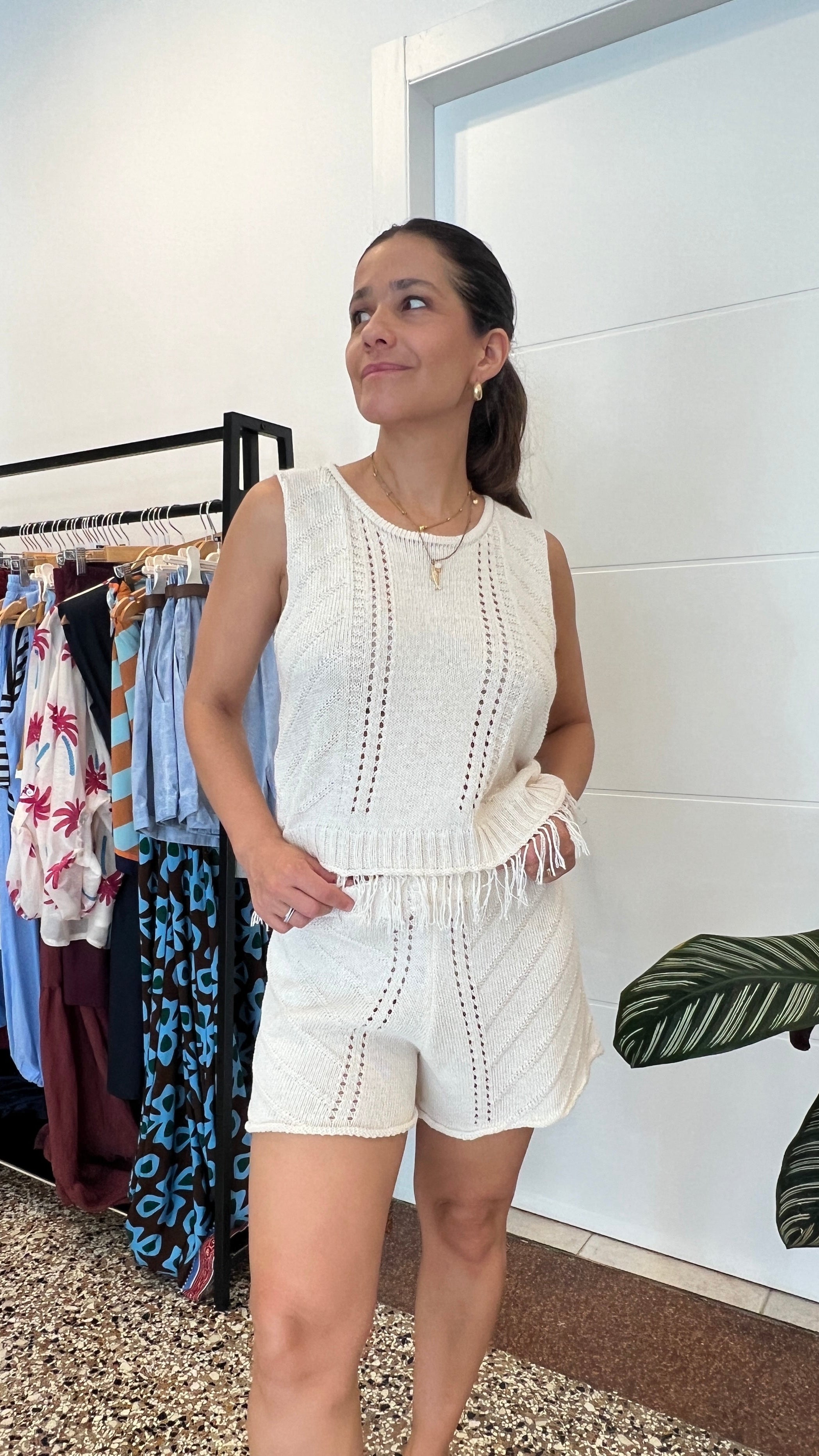 Coordinato composto da top e short, con elastico in vita, talla unica
